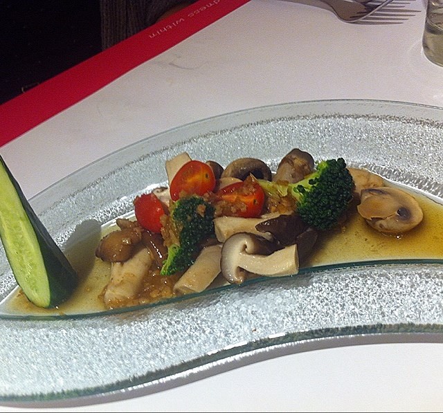 Button & shiitake mushrooms, broccoli, cherry tomatoes in vinegar