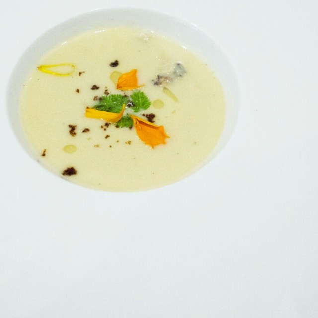 With crab, crumble and herb oil