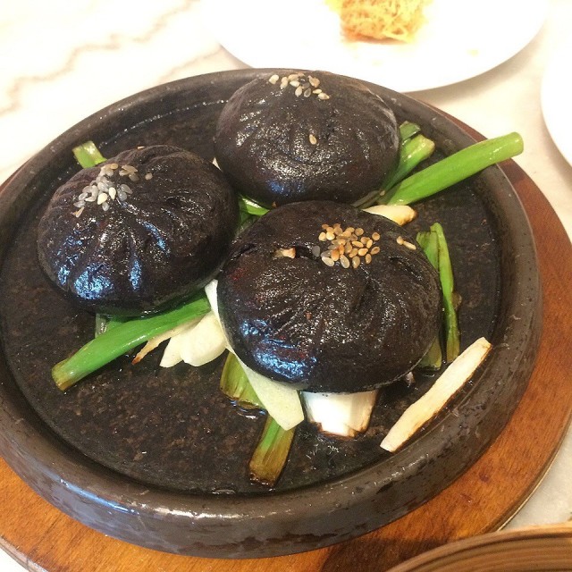 Steamed Mushroom buns with black truffle abalone sauce