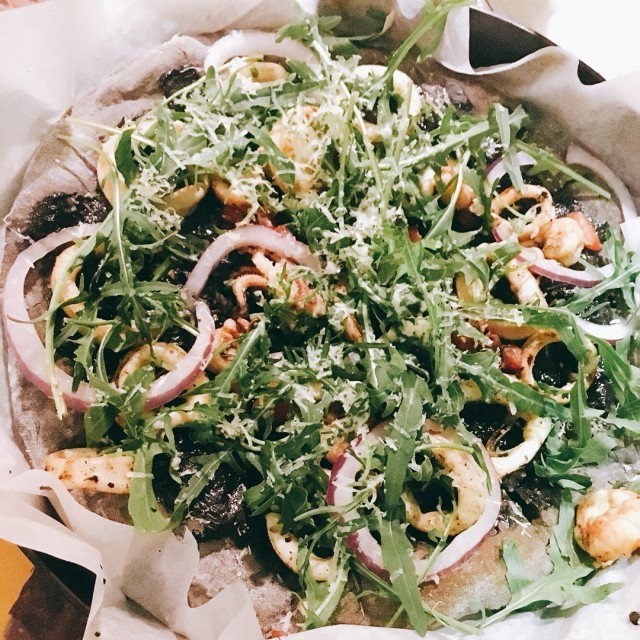 Squid ink skinny pizza